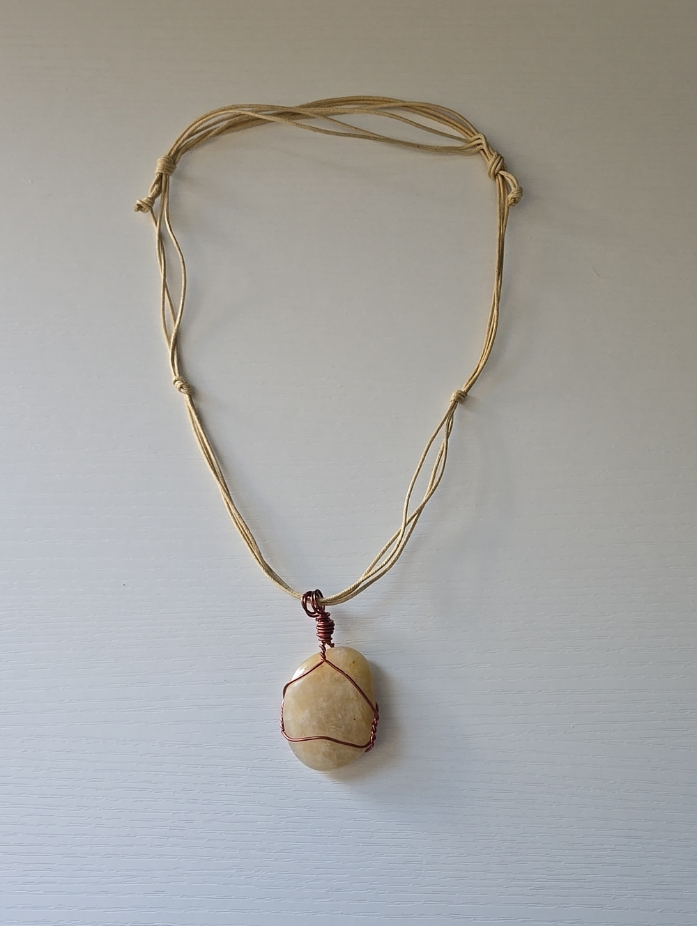 Hand Crafted Cream Stone Pendant with Copper Wire